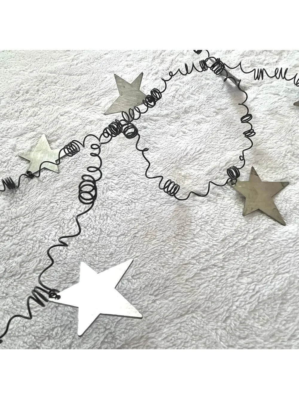 Handcrafted Garland Metal Stars on Coiled Wire 2-43